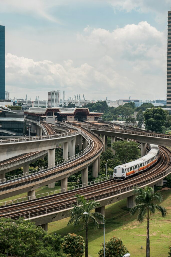 Singapore MRT train arriving at an elevated station, a common way to travel from Changi Airport to Bugis